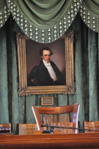 A formal portrait of Stephen F. Austin, done shortly before his death, hangs behind the Senate President’s chair