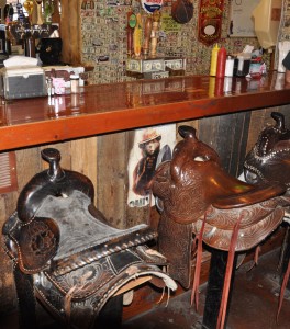 Where the bar stools are horse saddles,