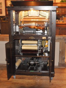  Voilano-Virtuoso – 1912 (labeled as “one of eight great inventions of the century” at the 1909Alaska-Yukon Exposition, this all electric device used solenoids and variable speed motors to control a paper roll to play the piano and violin and had 19 patents)