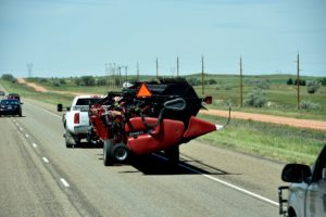 Passing Farm Equipment along I-94, Eastern Montana - 2016-07-08