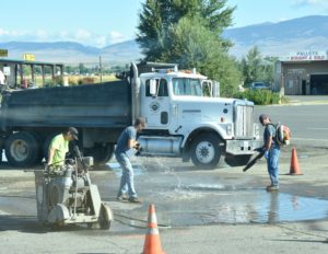 Three Men Trying to Remove a Puddle, Ellensburg, WA - 2106-07-19